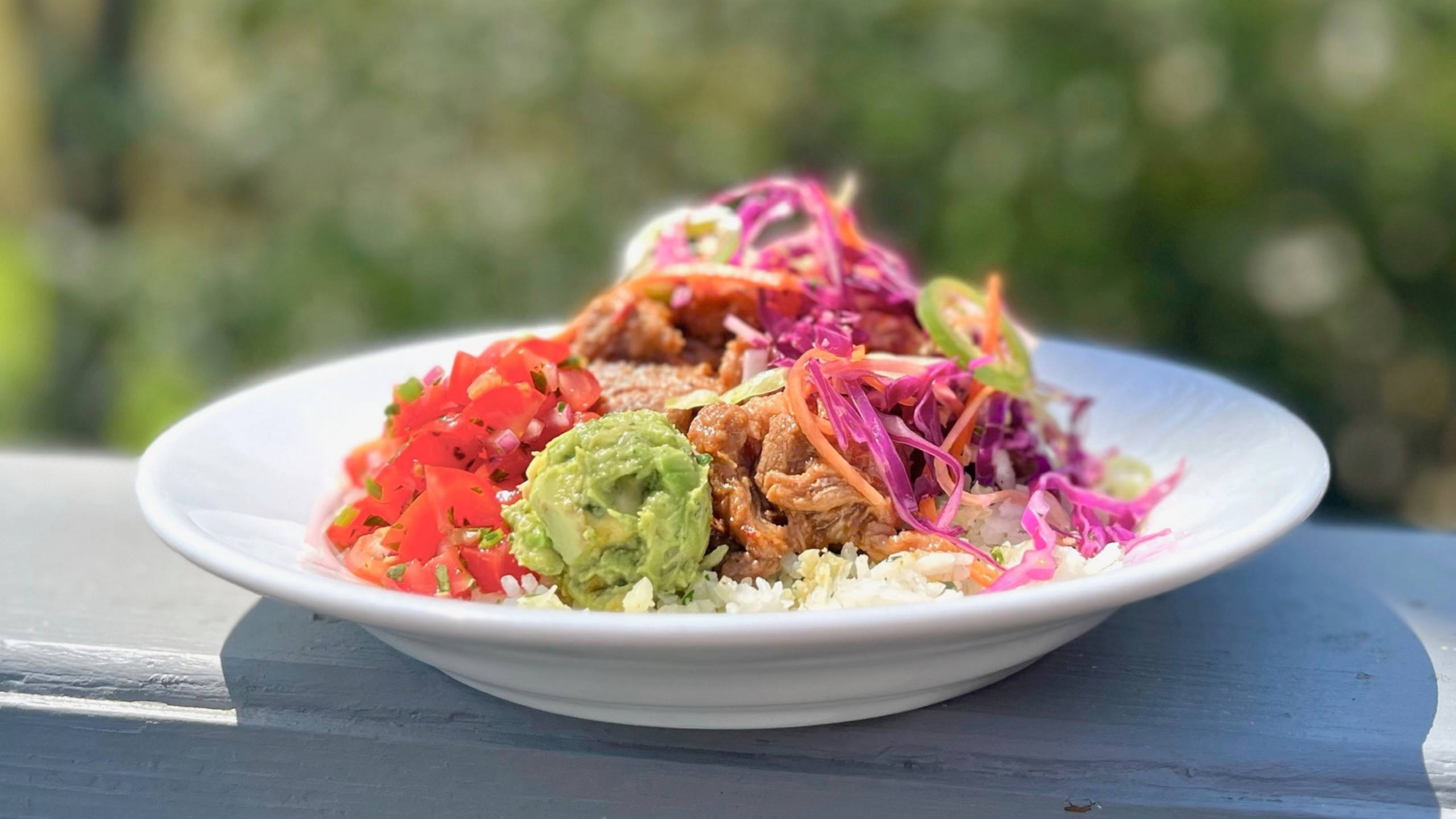 Pork Carnitas Bowl with Citrus Slaw, Guacamole & Pico de Gallo Paleo meal